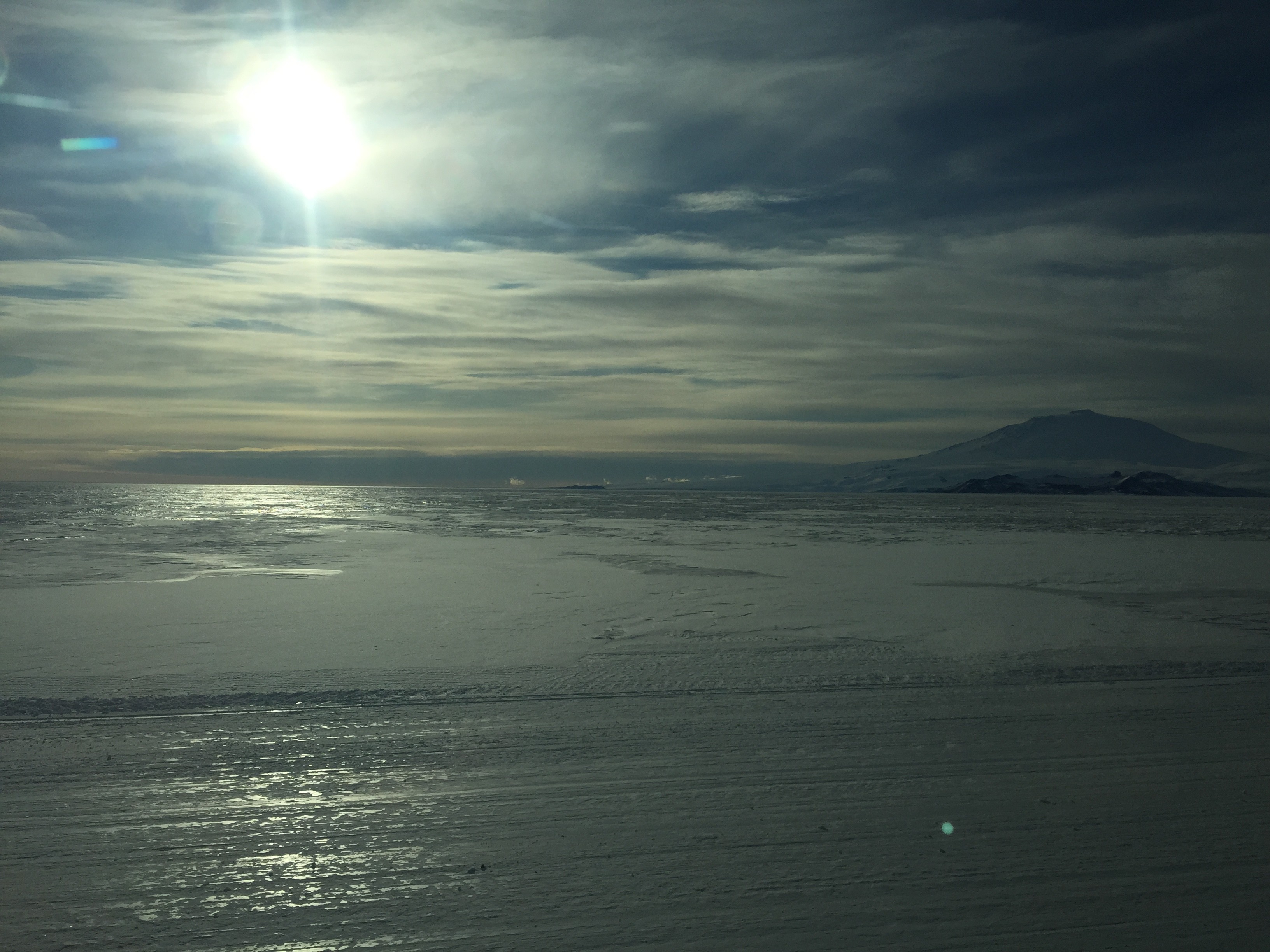 Drive from Pegasus Airfield to Scott base looking across the Ice Shelf and sea ice towards Ross Island