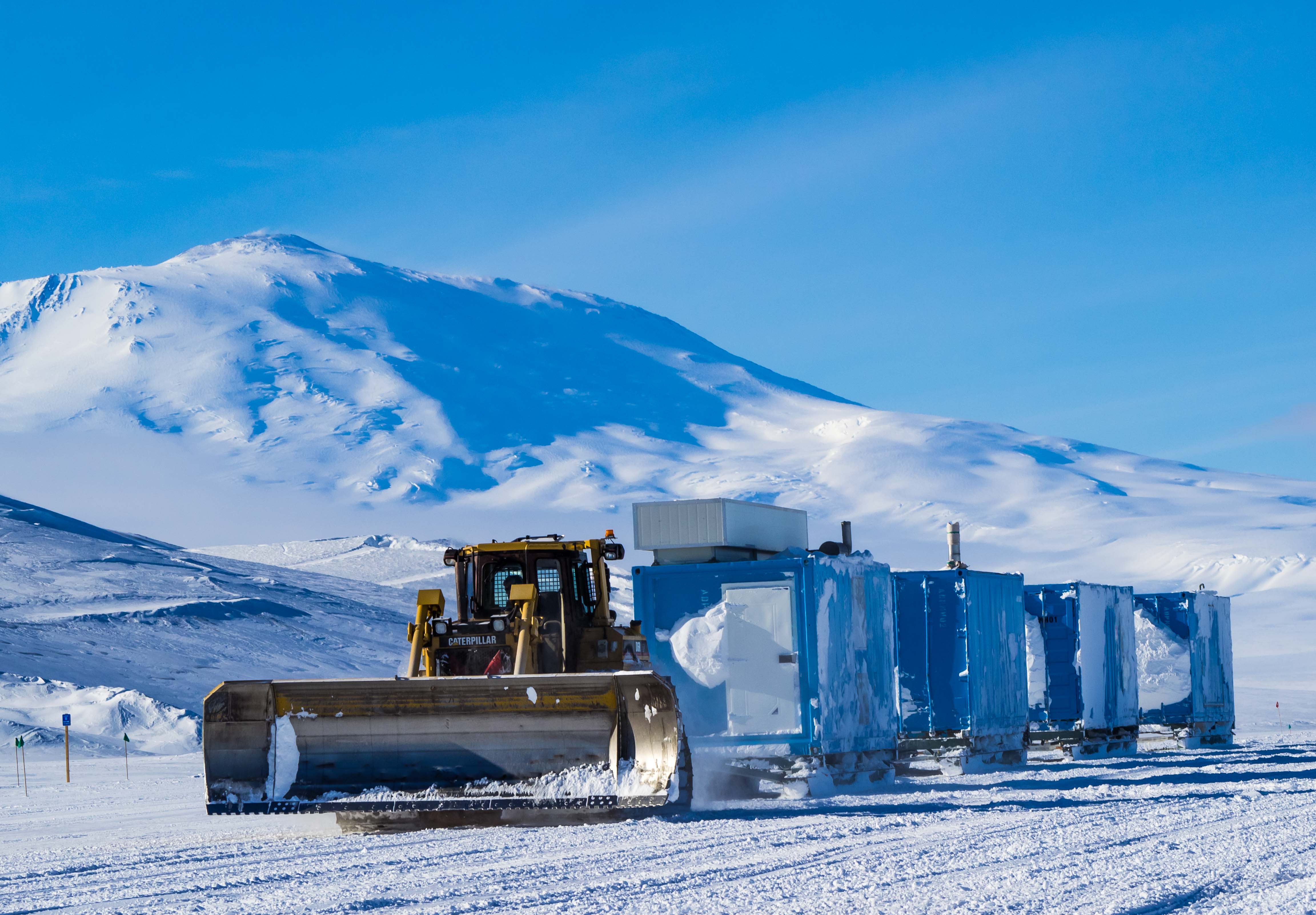 D6 Bulldozer bringing the ANDRILL containers back past Mt. Erebus