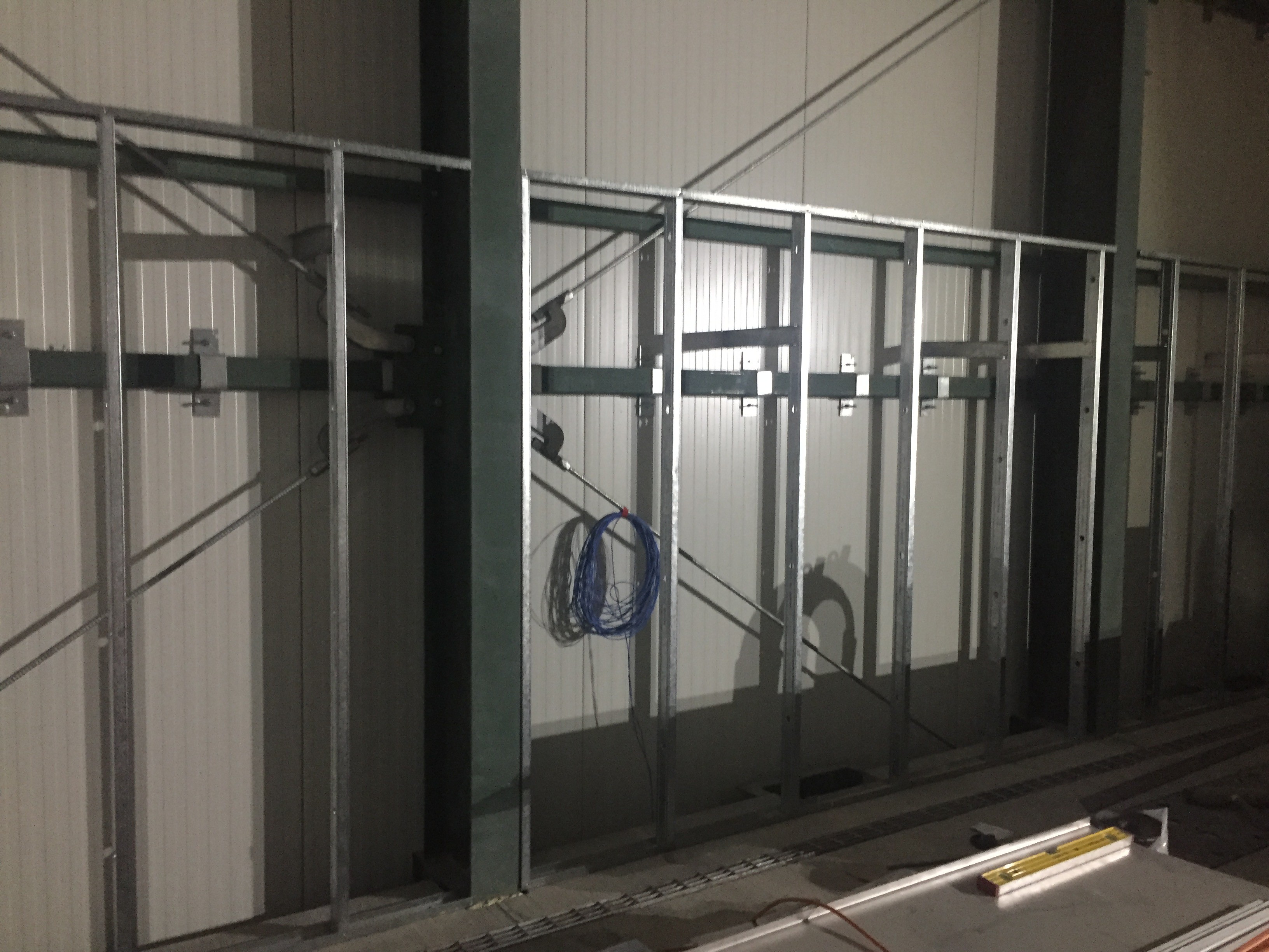 Internal steel stud wall starting to be put up inside the container dock