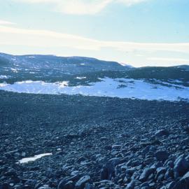 The snow bank with cave remains, Inexpressible Island