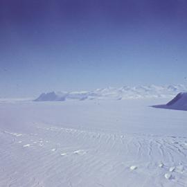 Looking up north side of Nimrod Glacier- Cambrian Bluff left distance, Cape Wilson extreme right
