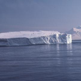 Berg off Deception Island. Livingstone Island behind
