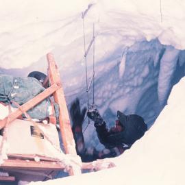 Crevasse accident- Larsen Glacier. J R Ricker on ladder