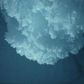 Crystals hanging from ice cave roof