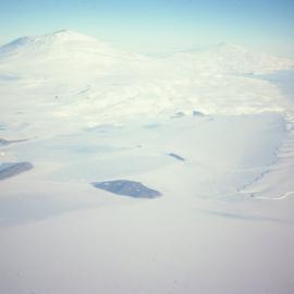 Ross Island- Mts Erebus and Terror, Erebus Glacier Tongue and Dellbridge Islands. Cape Evans at left