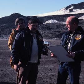 Norman Hardie, Jim Cavey, Brian Shoemaker after Scott Base beat McMurdo in tug-o-war for Governor O'Neal's trophy