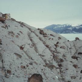 Till Glacial deposit on south side Dismal Buttress at head of Shackleton Glacier. View to Cumulus Hills