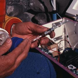 P. Selwyn with sample tube.