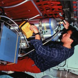 John Mak with gas measuring equipment