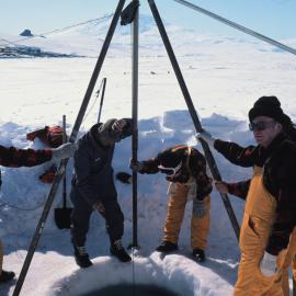 Knox fishing while net winched in.