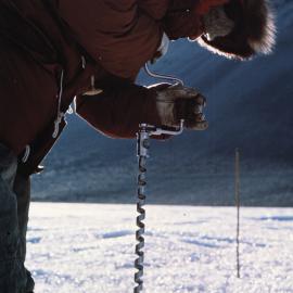 Drilling Ice Hole for Glaciology Studies 