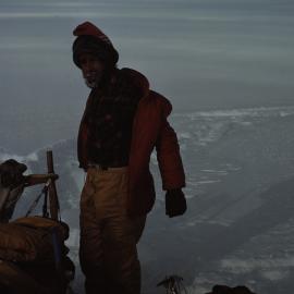 Changing jackets before tobogganing back to camp 