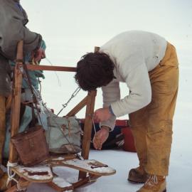 Graeme Ayers doing running sledge repairs en route 