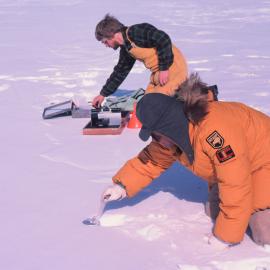 Taking Snow Sample for Refining Landsat Imagery Techniques