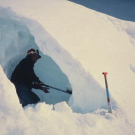 Bill Atkinson making snow cave 