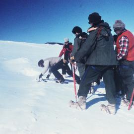 Survival school probing for crevasse