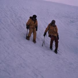 Bronwyn Baileary & Walt Fowlie cramponing down ice slope 