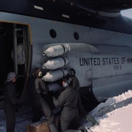 Fixing JATO bottles to Hercules to assist field 