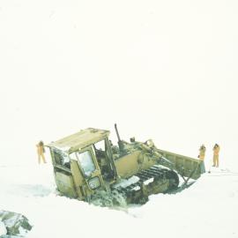 D4 Bulldozer in hole in sea ice