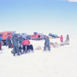 Waiting for the arrival of the Starlifter with a dog team