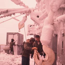 Chipping Ice from the 'Arneb's Derrick