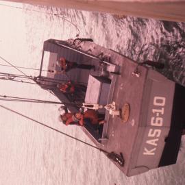 USS Arneb picking up loading craft