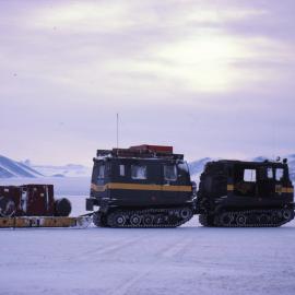 H16 Hägglunds cargo train with the Blue Glacier in the background