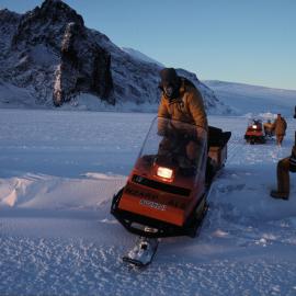 Negotiating a toboggan over a sea ice crack
