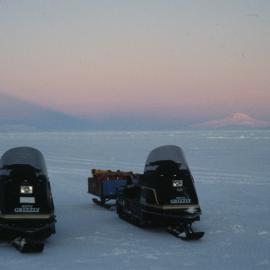 2 skidoos in the Autumn light