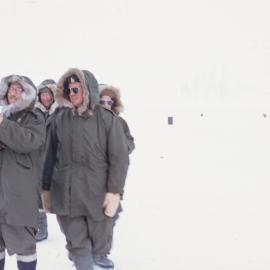 Geoff Markham holding an Adelie penguin