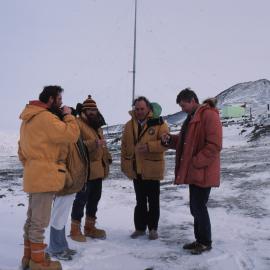 Rum tot at the flagpole issued by Commodore Tempero