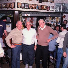 Lord Shackleton, Robert Baden Thomson and Lord Elworthy in the bar at Scott Base