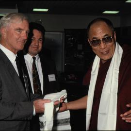 Keith Clegg and David Hawkey welcome the Dalai Lama to the International Antarctic Centre