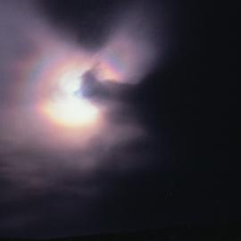 Corona in Clouds around the Sun
