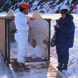 Graham Barrett and Princess Sirindhorn of Thailand by a seal cage at Razorback Island