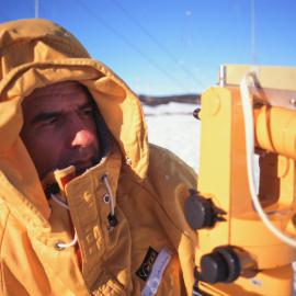 Information Visit: Lester Tomlinson (K102) collecting data outside Scott Base