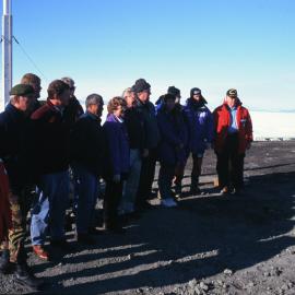 Group photo in front of the Scott Base flag pole