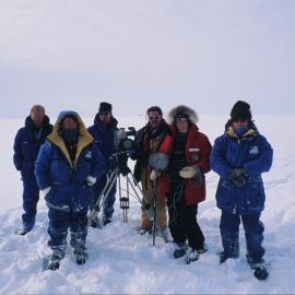 Artists in Antarctica Programme, L-R Tim Higham, Chris Orsman, Bill Manhire, camera crew, Nigel Brown