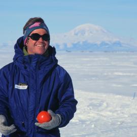 Colin Fox (K131) playing ball, Mt Discovery in the background