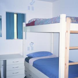 Q Hut Accommodation - beds