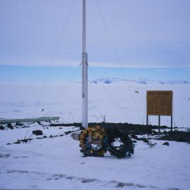 Wreaths at the Memorial Ceremony for Erebus at Sc ott base Flagpole