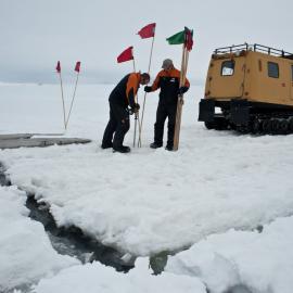 Bridging cracks in the sea ice