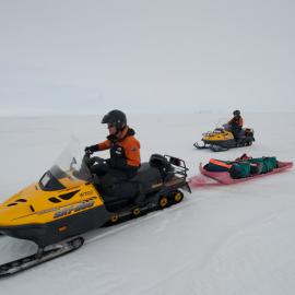 Travelling on the sea ice by Skidoo