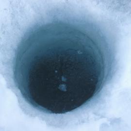 Hole in sea ice near Cape Hallett camp used for Plankton sampling