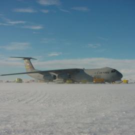 The plane on ice preparing to depart