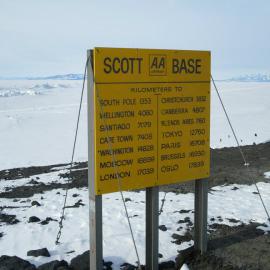 The AA sign at Scott Base showing distances to various cities
