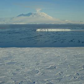Snow, sea and iceberg and Mt Erebus