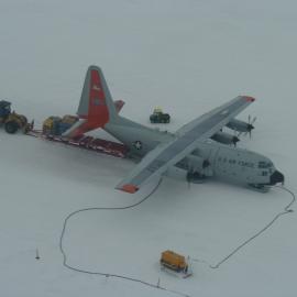 Looking down on a USAF ski hercules being unloaded