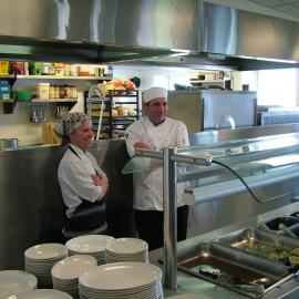 Summer 2009/10 chefs in the food serving area during the dinner for the wind farm celebration dinner