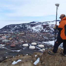 Locating a reference marking, top of Observation Hill.